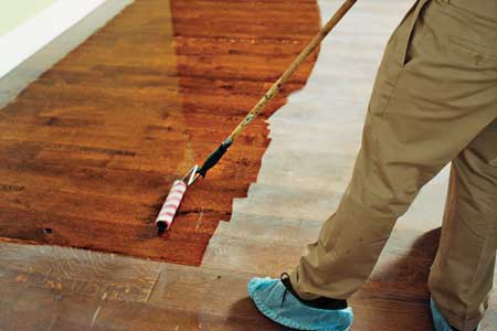 How do you sand a hardwood floor?